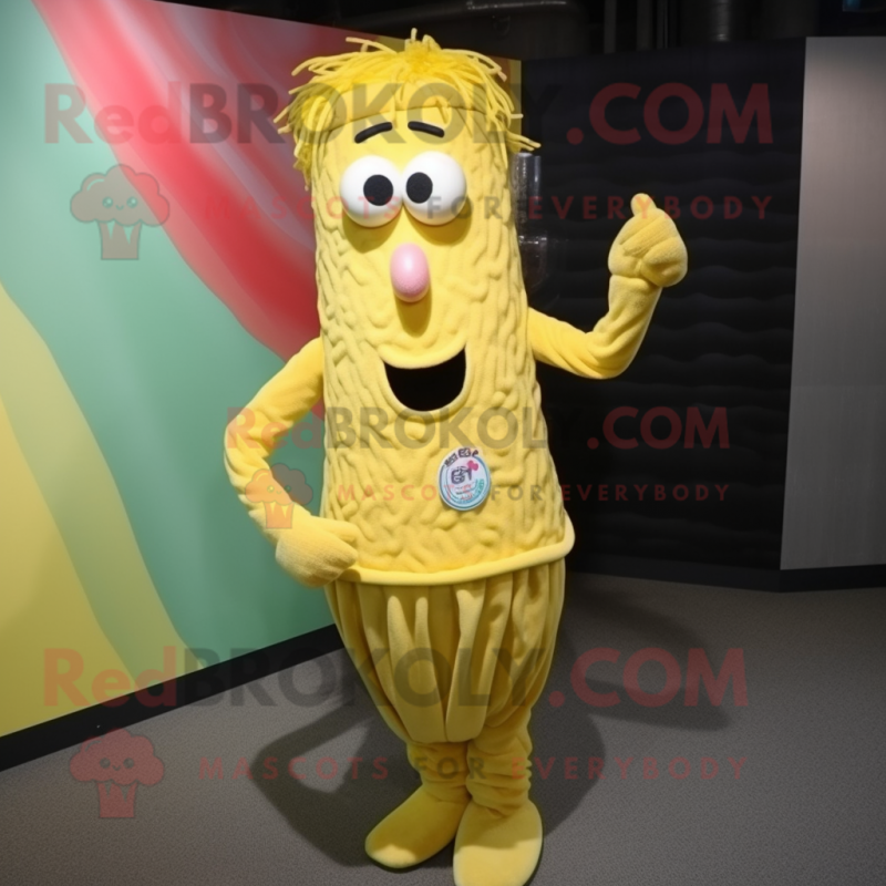 Yellow Spaghetti mascot costume character dressed with a Button-Up Shirt and Brooches