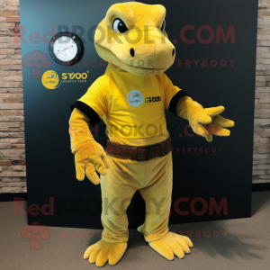 Yellow Komodo Dragon mascot costume character dressed with a Flare Jeans and Smartwatches