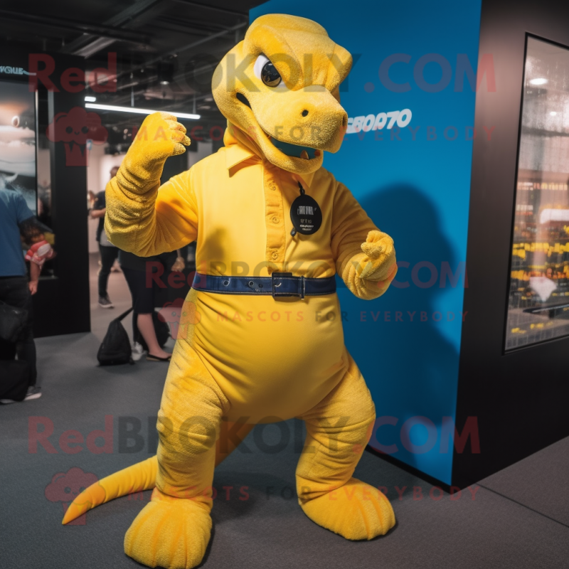 Yellow Komodo Dragon mascot costume character dressed with a Flare Jeans and Smartwatches