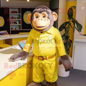 Lemon Yellow Chimpanzee mascot costume character dressed with a Playsuit and Cufflinks