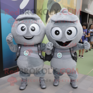 Gray Wrist Watch mascot costume character dressed with a Blouse and Backpacks