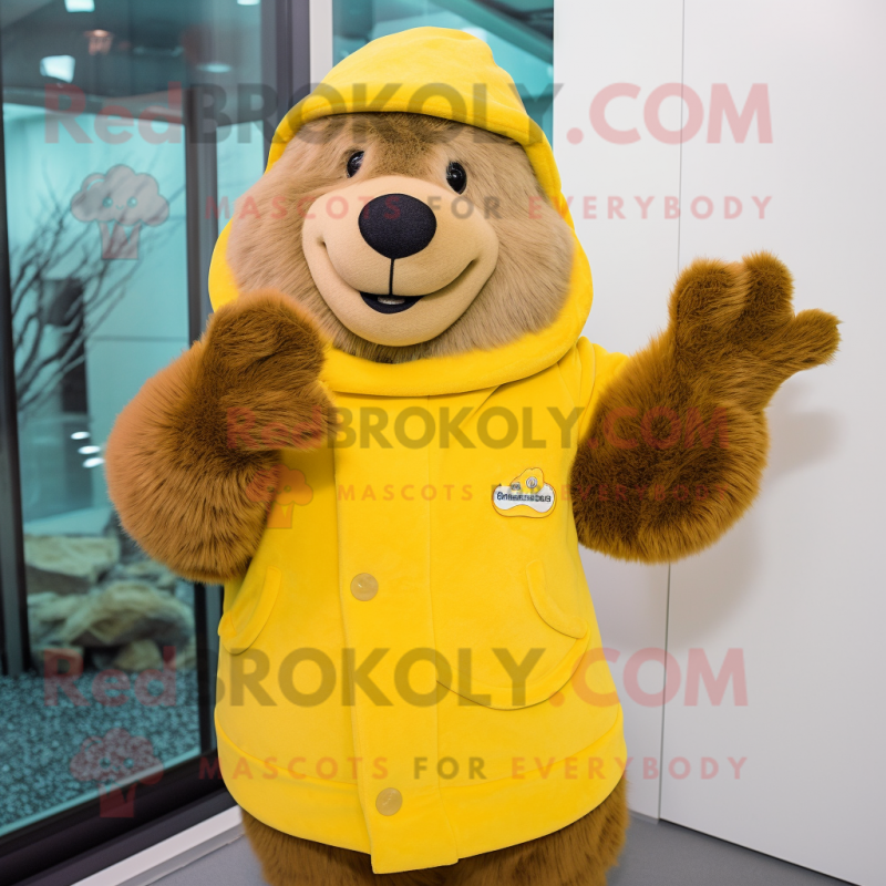 Yellow Beaver mascot costume character dressed with a Coat and Mittens