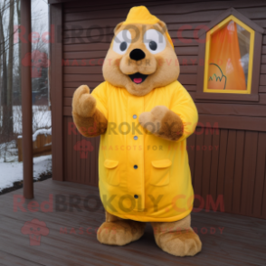 Yellow Beaver mascot costume character dressed with a Coat and Mittens