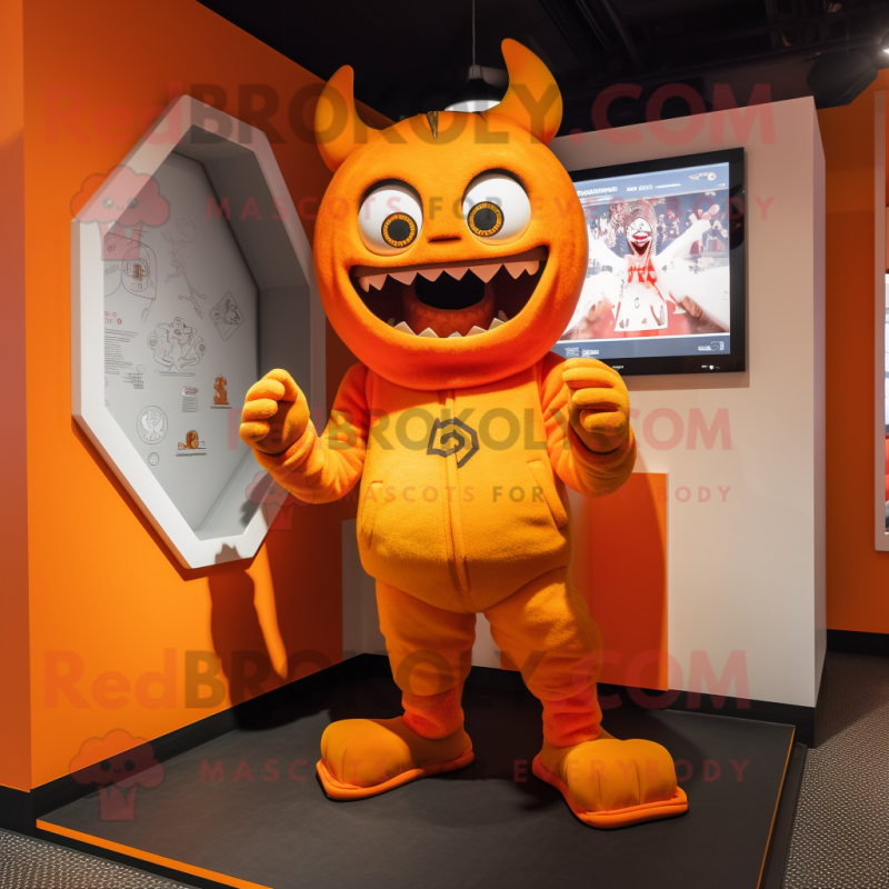 Orange Demon mascot costume character dressed with a Hoodie and Anklets Orange Demon mascot costume character dressed with a Hoodie and Anklets