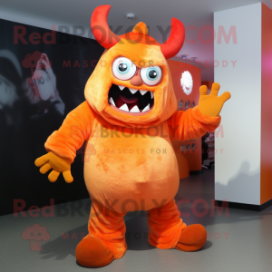 Orange Demon mascot costume character dressed with a Hoodie and Anklets