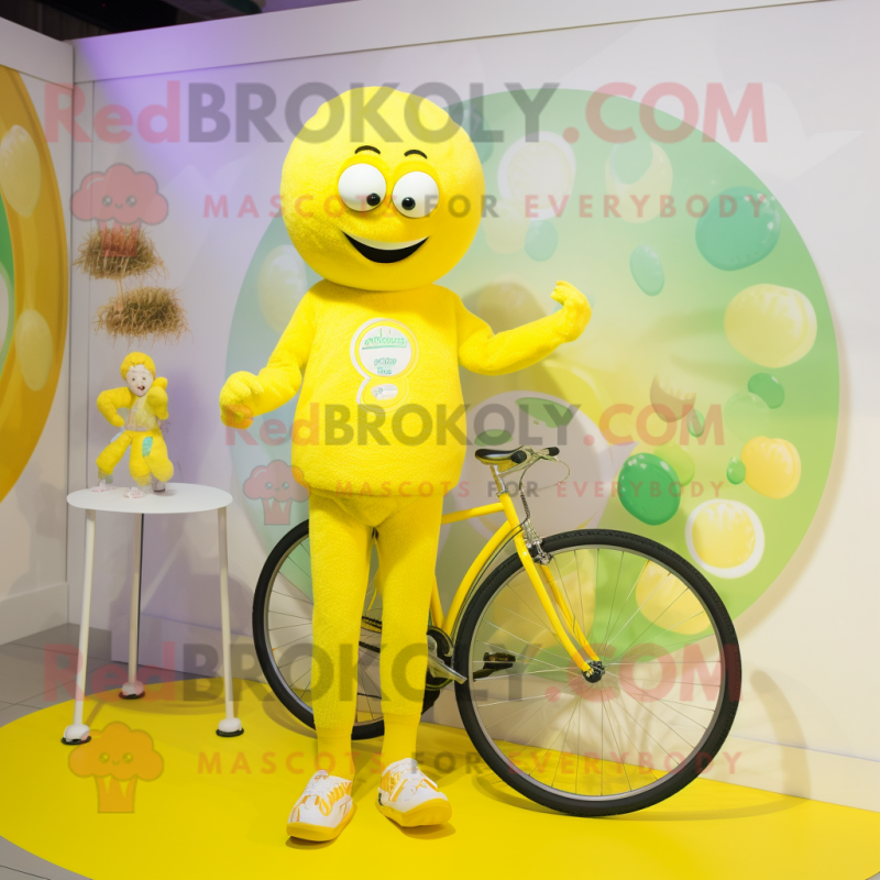 Lemon Yellow Unicyclist mascot costume character dressed with a Playsuit and Keychains