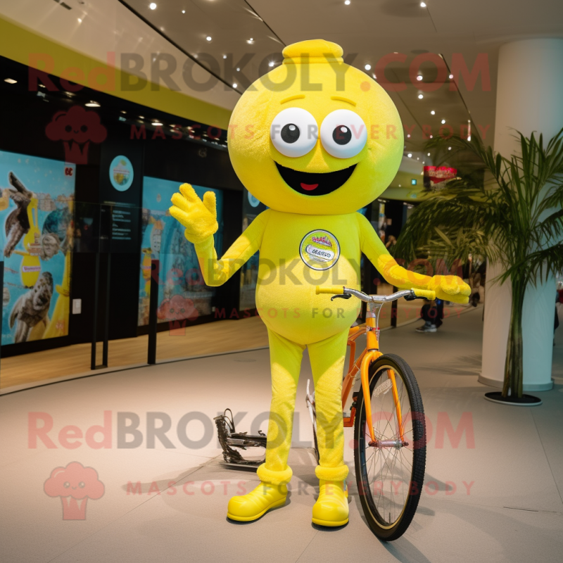 Lemon Yellow Unicyclist mascot costume character dressed with a Playsuit and Keychains