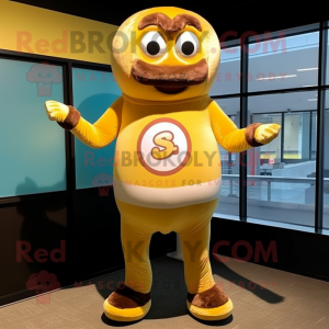 Gold Donut mascot costume character dressed with a Rash Guard and Suspenders
