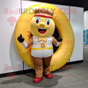 Gold Donut mascot costume character dressed with a Rash Guard and Suspenders