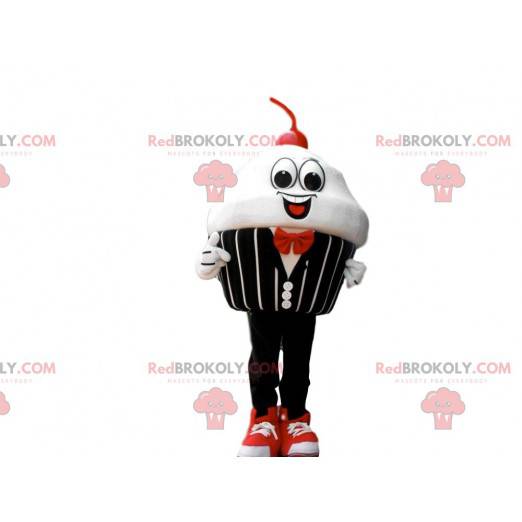 Mascot cream cake with a cherry, elegant costume -