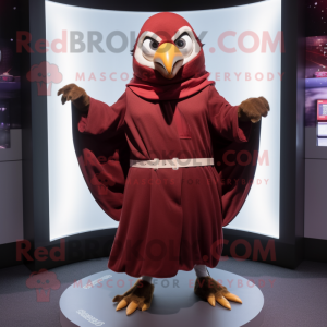 Maroon Dove mascot costume character dressed with a Hoodie and Rings