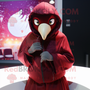 Maroon Dove mascot costume character dressed with a Hoodie and Rings