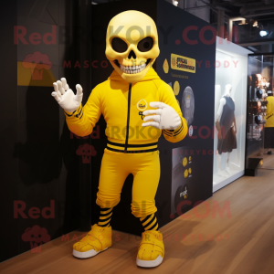 Yellow Skull mascot costume character dressed with a Joggers and Mittens