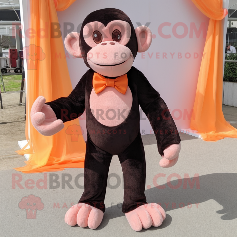 Peach Chimpanzee mascot costume character dressed with a Long Sleeve Tee and Bow ties