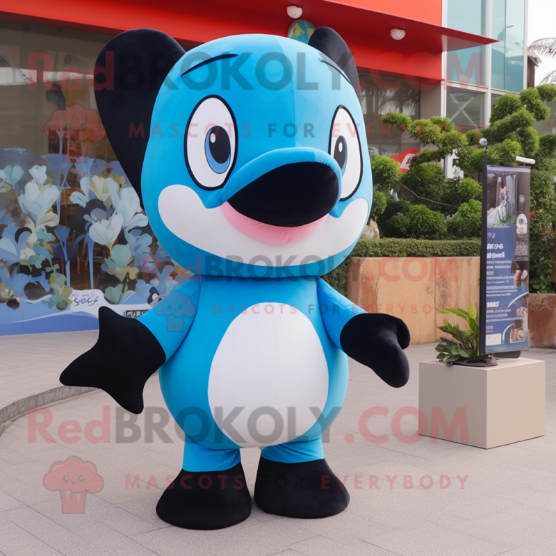 Sky Blue Killer Whale mascot costume character dressed with a Romper and Keychains