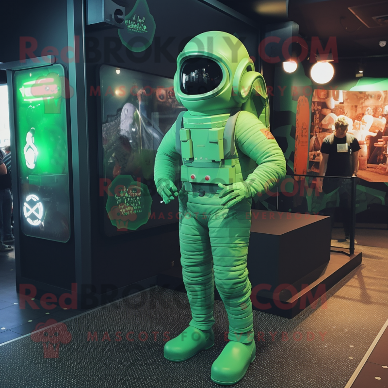 Green Astronaut mascot costume character dressed with a Joggers and Pocket squares