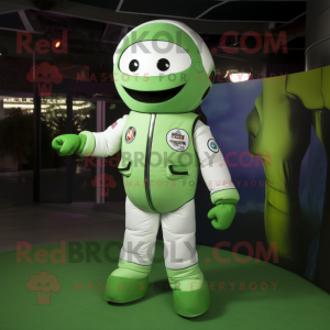Green Astronaut mascot costume character dressed with a Joggers and Pocket squares