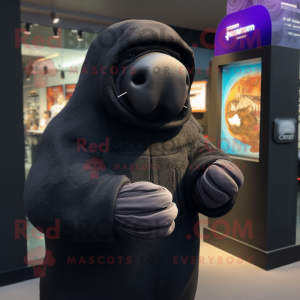 Black Walrus mascot costume character dressed with a Hoodie and Mittens