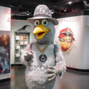 Silver Chicken mascot costume character dressed with a Graphic Tee and Hat pins