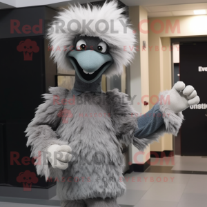 Gray Emu mascot costume character dressed with a Flare Jeans and Mittens