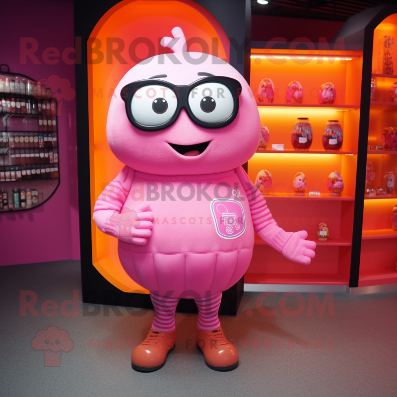 Pink Grenade mascot costume character dressed with a Sweater and Eyeglasses