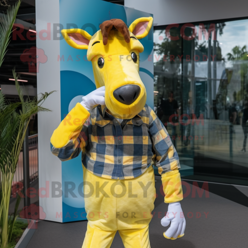 Lemon Yellow Okapi mascot costume character dressed with a Flannel Shirt and Hair clips