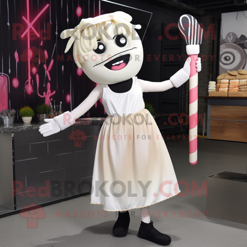 Cream Knife Thrower mascot costume character dressed with a Cocktail Dress and Headbands Cream Knife Thrower mascot costume character dressed with a Cocktail Dress and Headbands