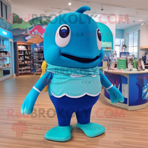 Teal Blue Whale mascot costume character dressed with a Graphic Tee and Brooches