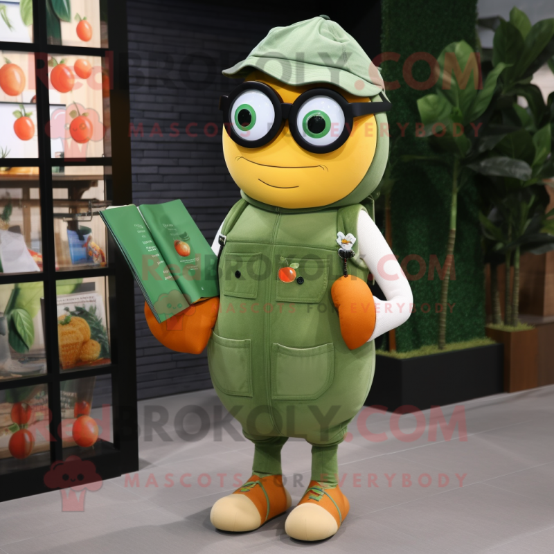 Olive Mandarin mascot costume character dressed with a Dungarees and Reading glasses Olive Mandarin mascot costume character dressed with a Dungarees and Reading glasses
