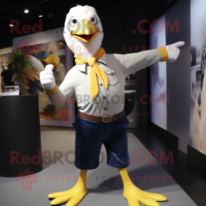Gold Gull mascot costume character dressed with a Jeans and Ties
