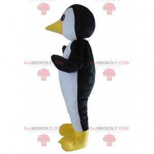Mascotte del pinguino in bianco e nero completamente