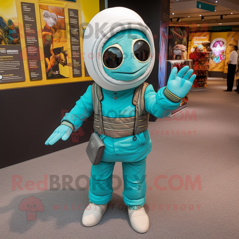 Turquoise Mummy mascot costume character dressed with a Bomber Jacket and Watches