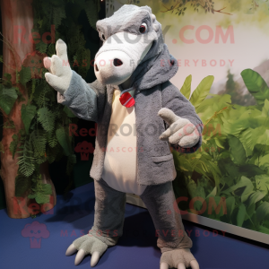 Gray Crocodile mascot costume character dressed with a Cardigan and Mittens