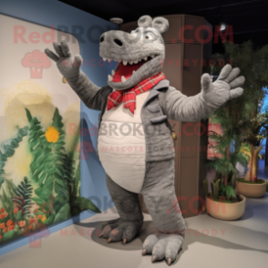 Gray Crocodile mascot costume character dressed with a Cardigan and Mittens