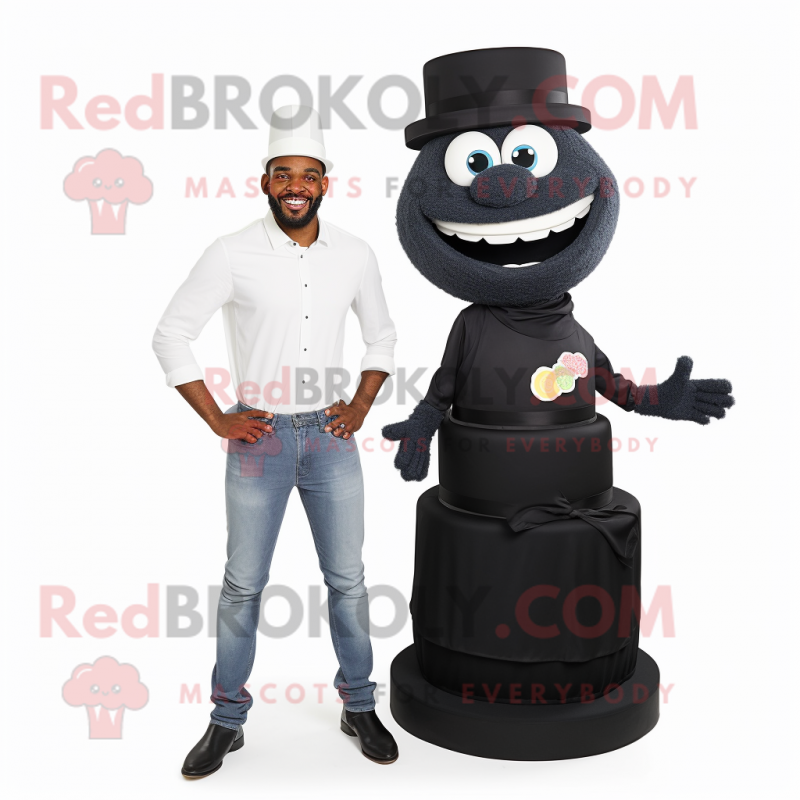 Black Wedding Cake mascot costume character dressed with a Bootcut Jeans and Pocket squares Black Wedding Cake mascot costume character dressed with a Bootcut Jeans and Pocket squares