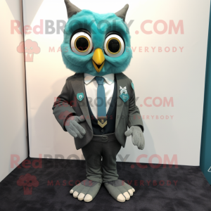 Teal Owl mascot costume character dressed with a Suit and Pocket squares