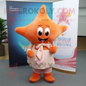 Peach Starfish mascot costume character dressed with a T-Shirt and Scarves