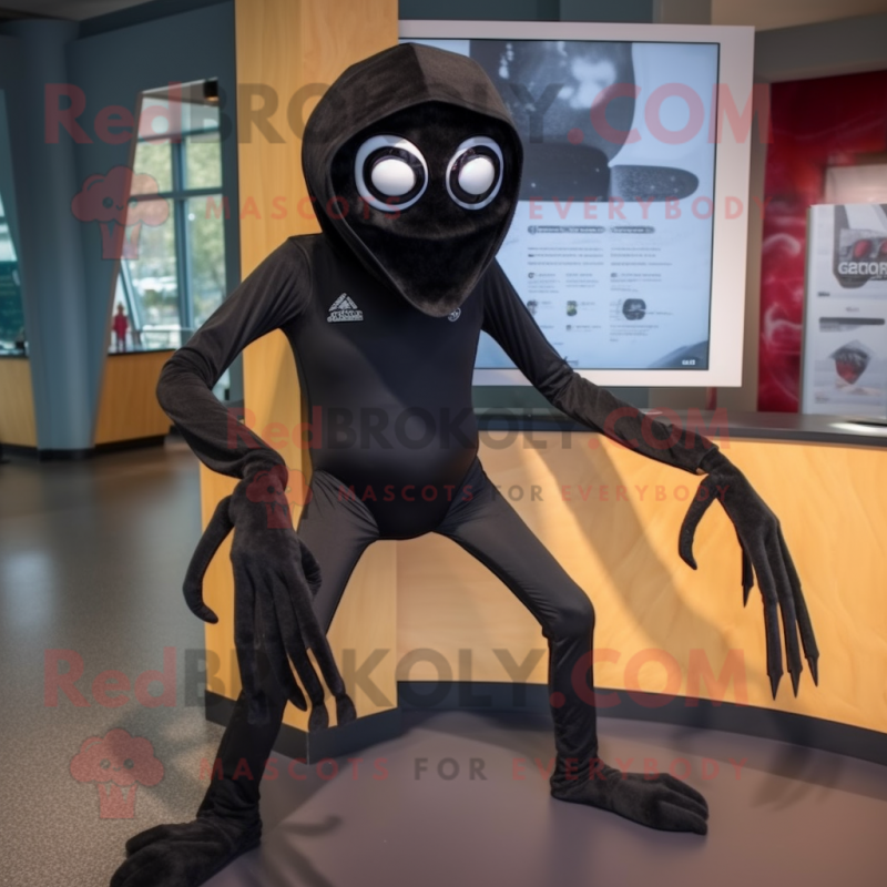 Black Spider mascot costume character dressed with a Rash Guard and Shoe laces Black Spider mascot costume character dressed with a Rash Guard and Shoe laces
