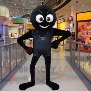 Black Spider mascot costume character dressed with a Rash Guard and Shoe laces