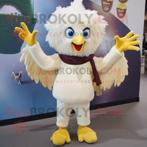 Cream Harpy mascot costume character dressed with a Flare Jeans and Cummerbunds