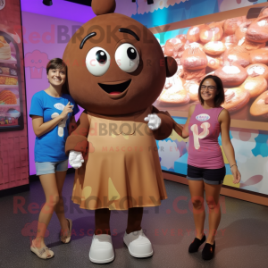 Tan Chocolate Bar mascot costume character dressed with a Mini Dress and Watches