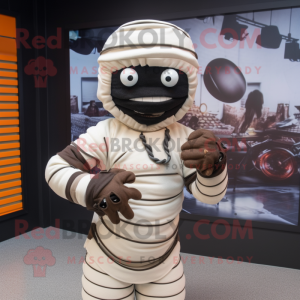 Black Mummy mascot costume character dressed with a Baseball Tee and Bracelets