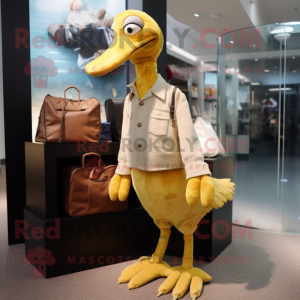Gold Dodo Bird mascot costume character dressed with a Trousers and Wallets