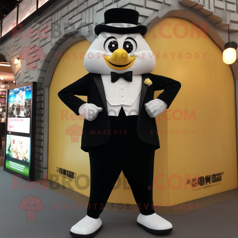 Cream Pad Thai mascot costume character dressed with a Tuxedo and Digital watches Cream Pad Thai mascot costume character dressed with a Tuxedo and Digital watches