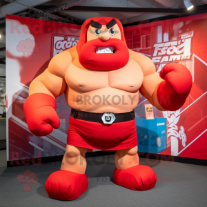 Red Strongman maskot...