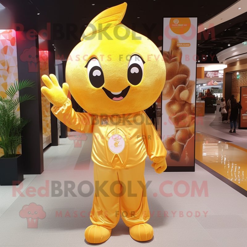 Gold Plum mascot costume character dressed with a Jumpsuit and Keychains