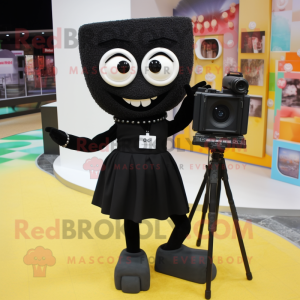 Black Camera mascot costume character dressed with a Pencil Skirt and Anklets