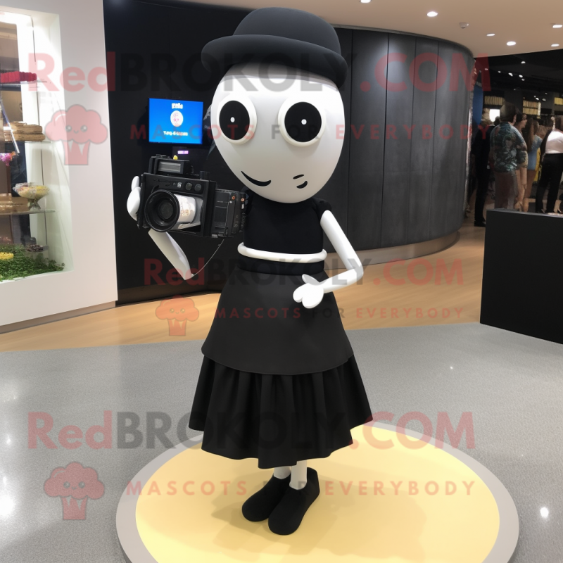 Black Camera mascot costume character dressed with a Pencil Skirt and Anklets Black Camera mascot costume character dressed with a Pencil Skirt and Anklets