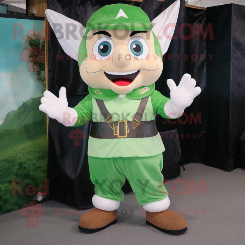Green Tooth Fairy mascot costume character dressed with a Cargo Shorts and Gloves Green Tooth Fairy mascot costume character dressed with a Cargo Shorts and Gloves