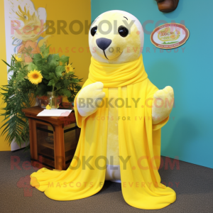 Lemon Yellow Seal mascot costume character dressed with a Capri Pants and Shawl pins